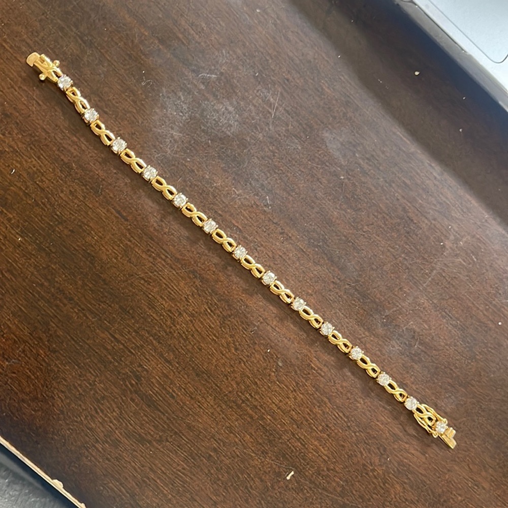 Lia Sophia gold tone tennis bracelet with clear stones